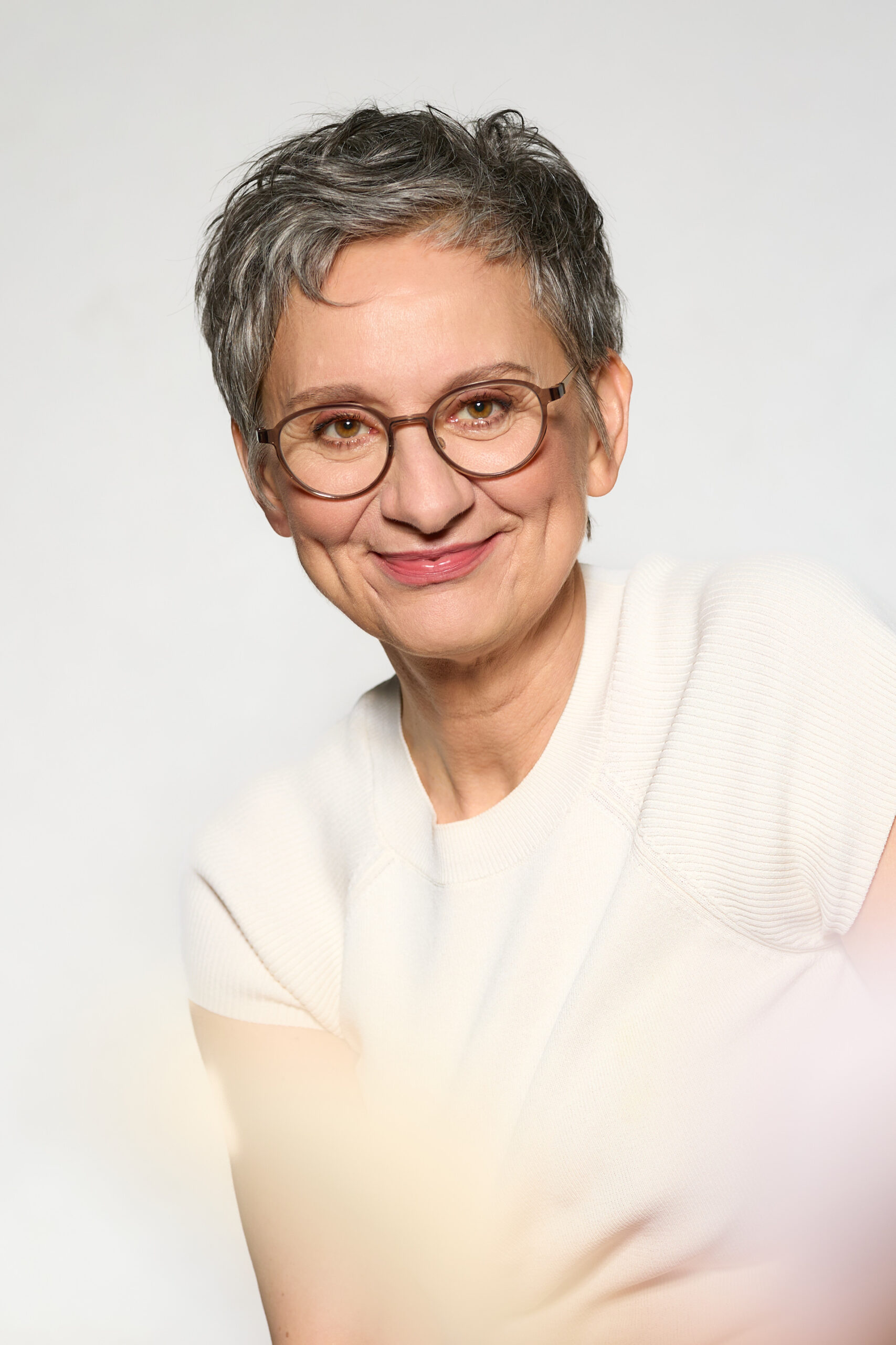 Personal-Branding-Shooting Eva Kräling – Nahaufnahme-Portrait mit warmem Gegenlicht